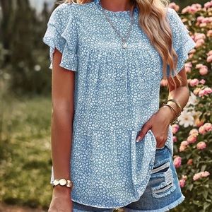 Pale blue and white leopard print flowy top